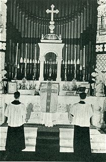 The Priest Places the Chalice