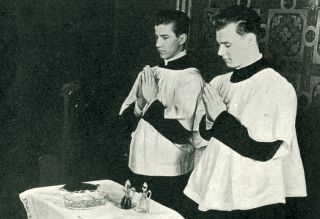 The Servers Assist the Priest with Water and Wine