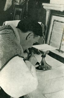 The Communion of the Body of Our Lord by Priest